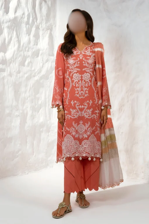 Stylish lawn outfit showcasing embroidered front kali with printed back and sleeves, paired with a cozy yarn dyed karandi dupatta and soft cotton pants